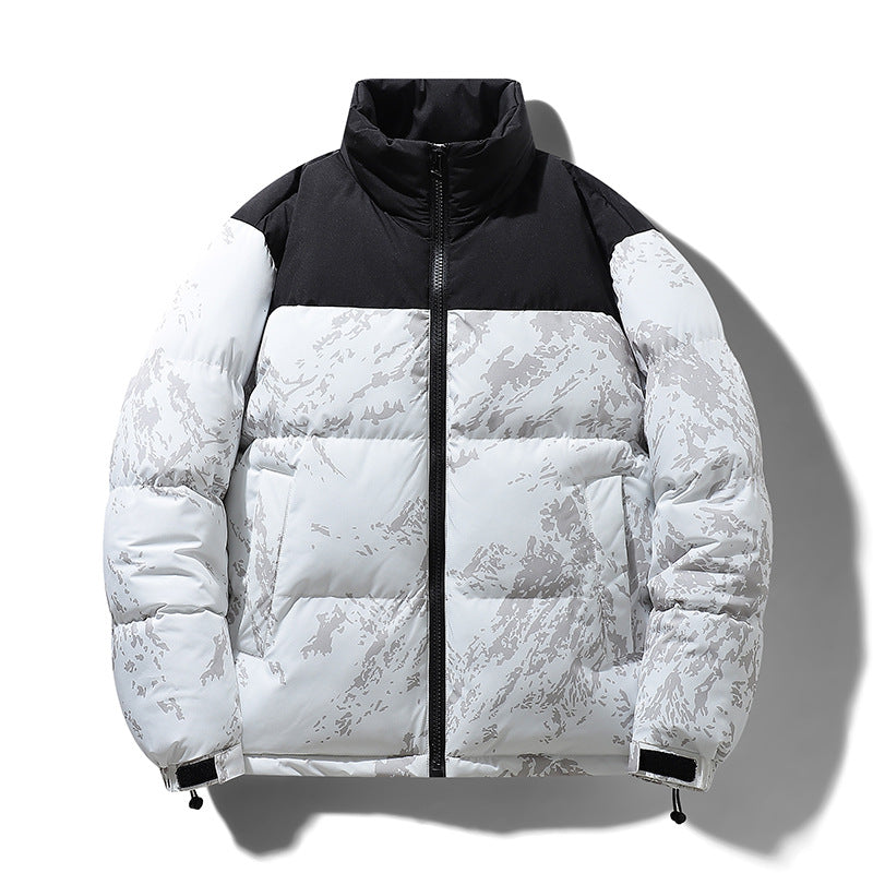 White and black puffer jacket with a textured pattern on a white background
