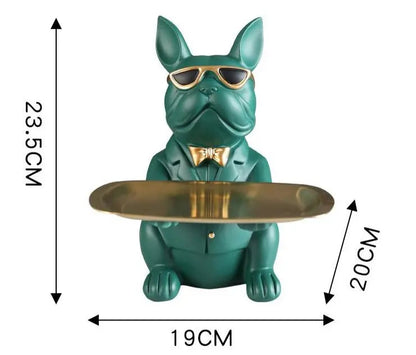 Green dog-shaped holder with a gold tray, sunglasses, and a bow tie, with dimensions indicated.