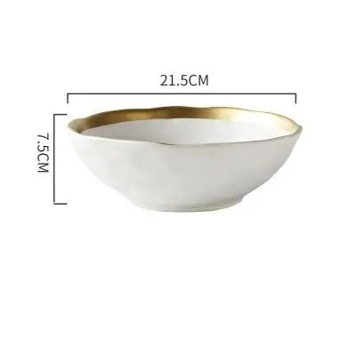 White bowl with gold rim and measurements on a white background