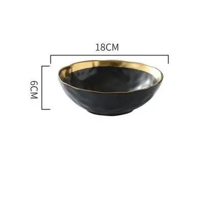 Black bowl with gold rim and measurements on a white background