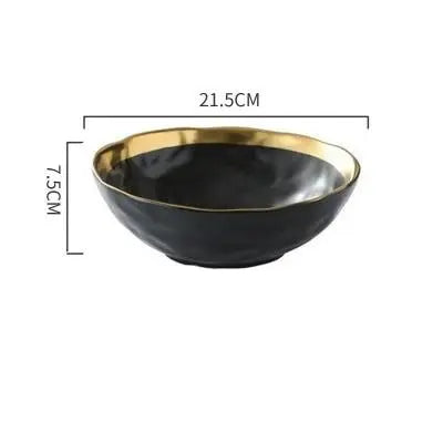 Black bowl with gold rim and measurements on a white background