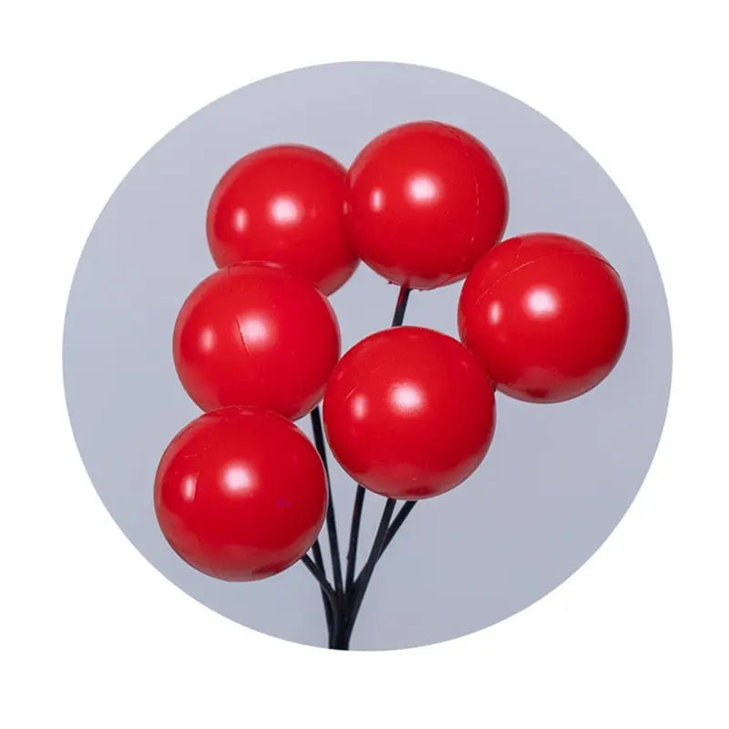 Red spherical objects on a white background