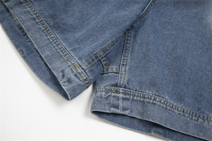 Close-up of blue denim fabric on a white background