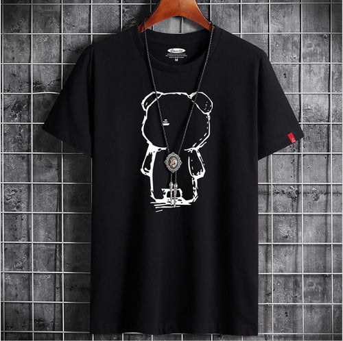 Black t-shirt with white graphic design on a hanger against a tiled wall background