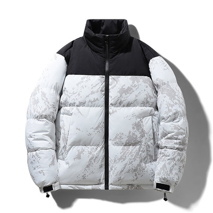 White and black puffer jacket with a textured pattern on a white background