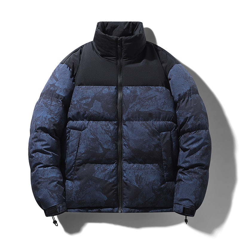 Blue and black puffer jacket on a white background