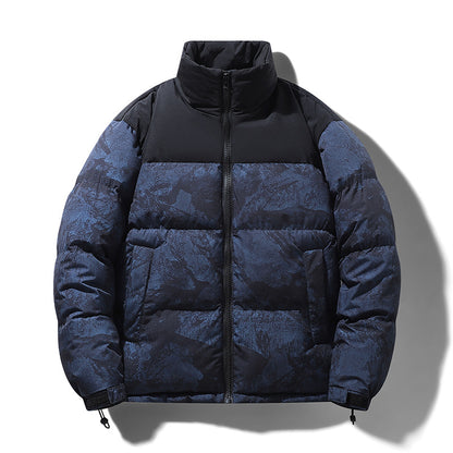 Blue and black puffer jacket on a white background