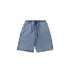 Blue denim shorts on a white background