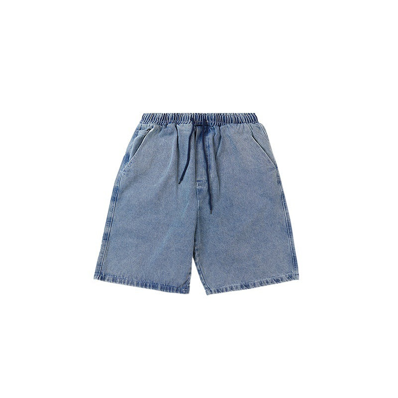 Blue denim shorts on a white background