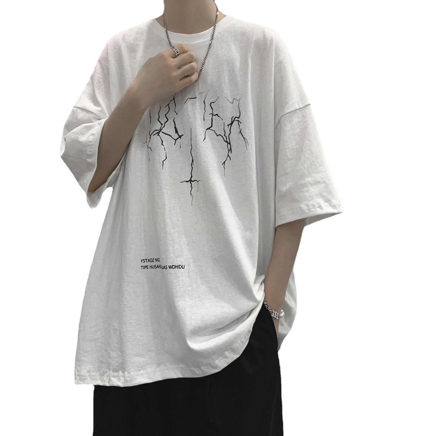 Person wearing a white t-shirt with black graphics on a white background