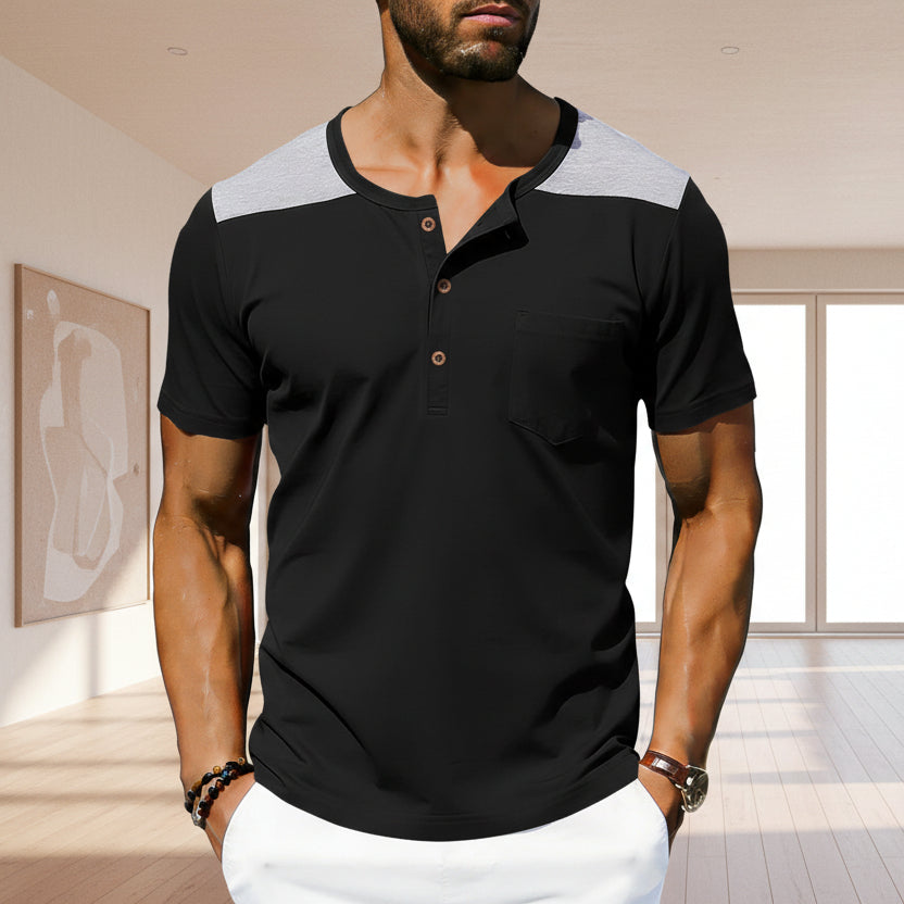 Black and gray short-sleeve henley shirt worn by a person on a white background