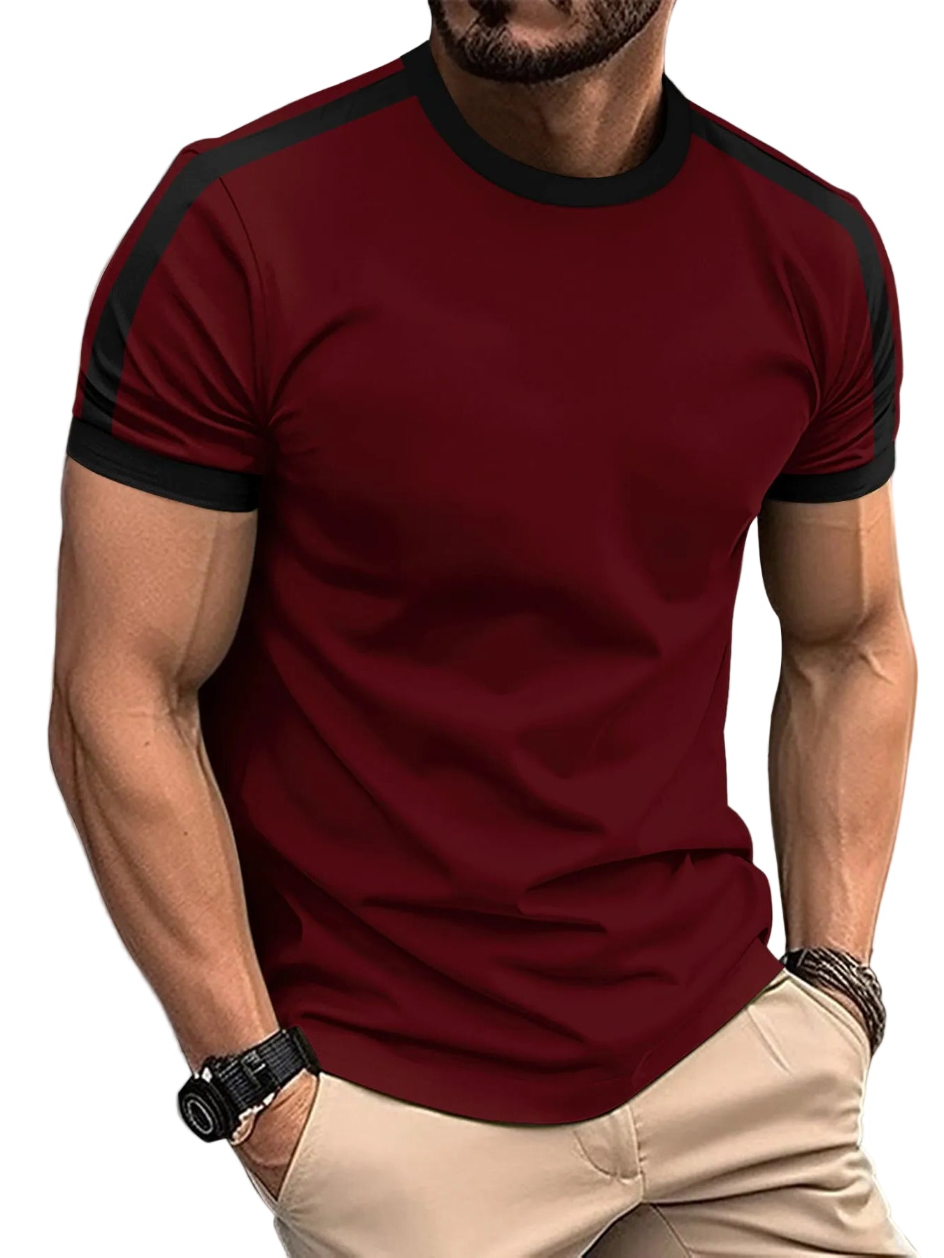 Man wearing a red t-shirt with black trim on a city street