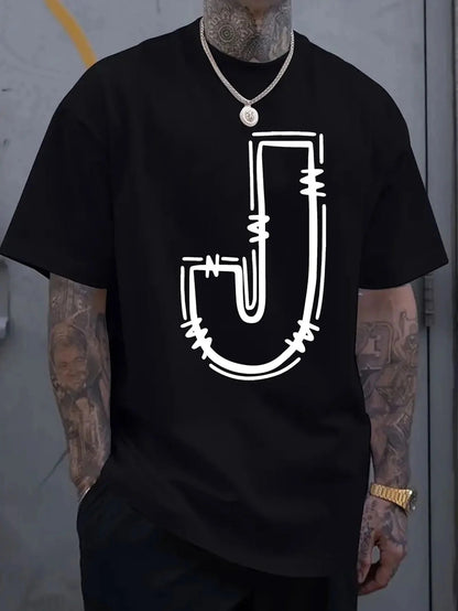 Person wearing a black t-shirt with a white geometric design on a plain background