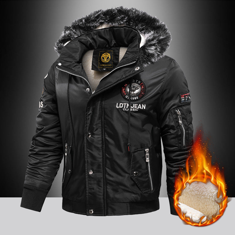 Black winter jacket with fur-lined hood on a dark background