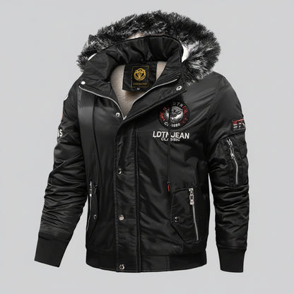 Black winter jacket with fur-lined hood on a dark background