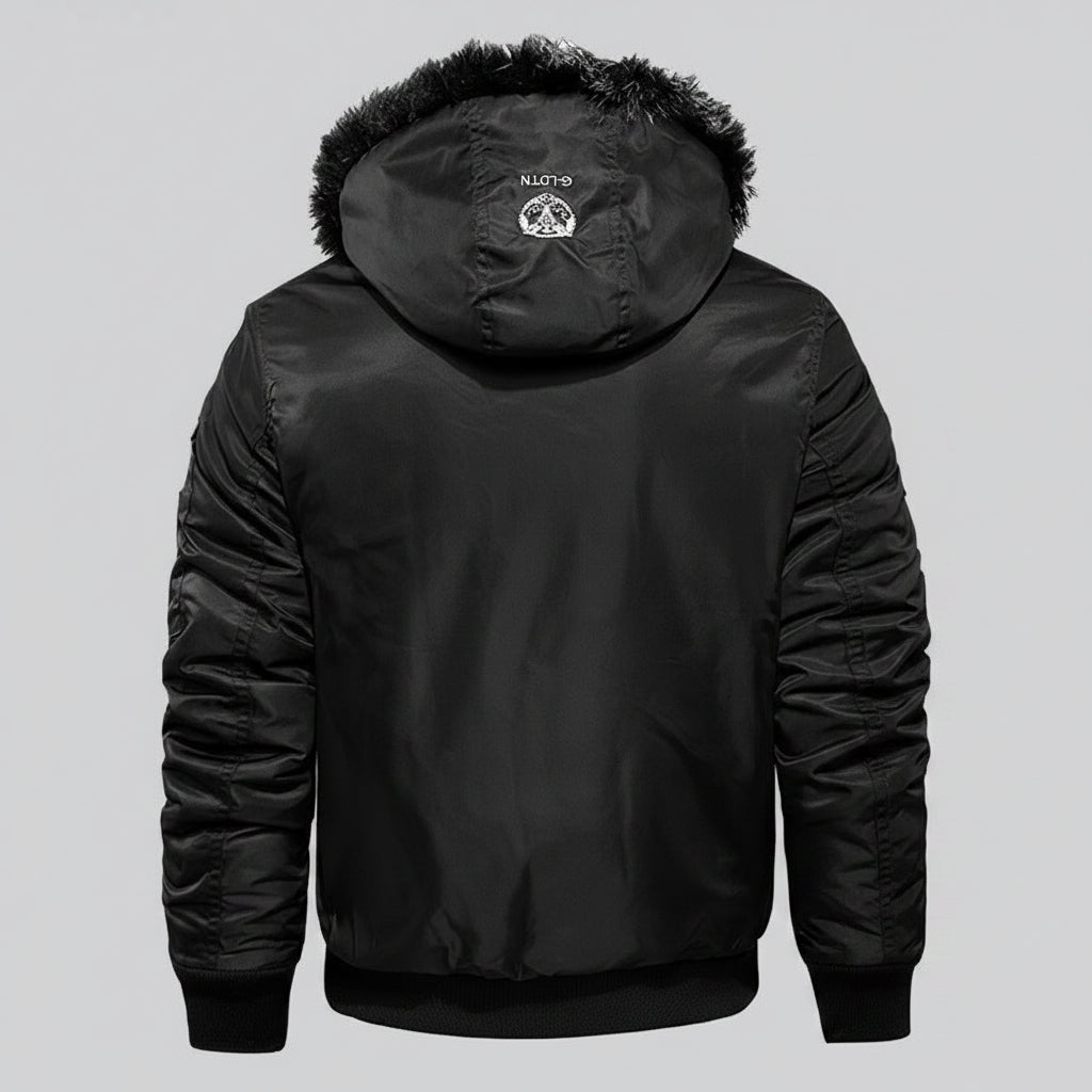 Black winter jacket with fur-lined hood and flame graphic on a dark background
