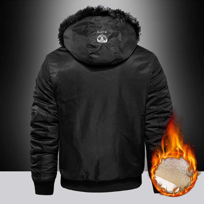 Black winter jacket with fur-lined hood and flame graphic on a dark background
